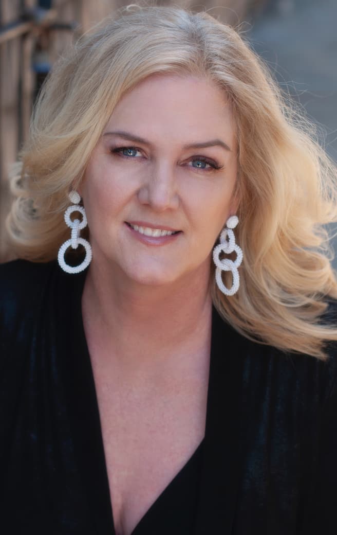 Cora, founder of Stay Clear Beauty and licensed esthetician a decade and a half of experience treating acne-prone, aging and sensitive skin."