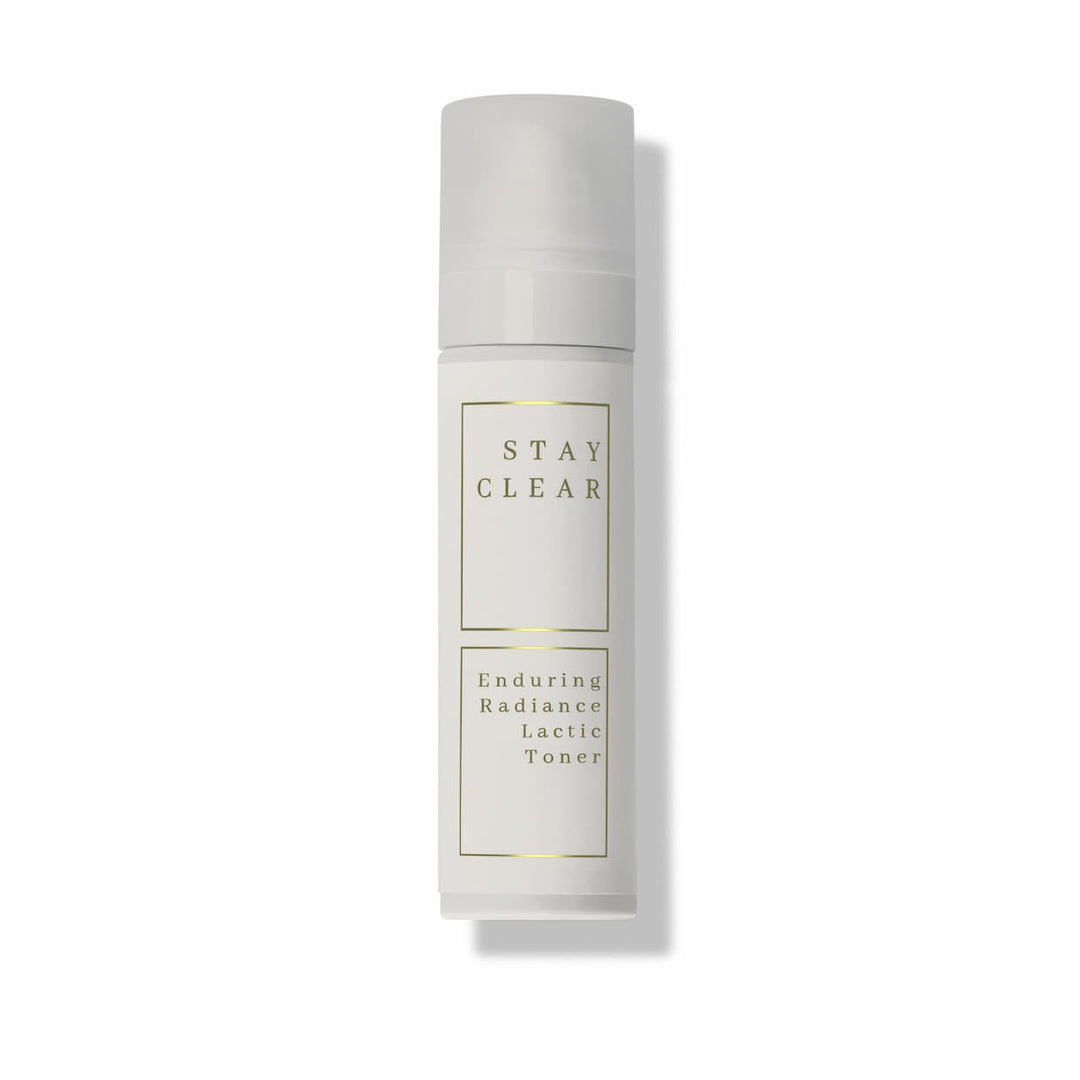 Stay Clear Beauty Enduring Radiance Lactic Toner bottle on neutral background — lactic acid toner for brightening, gentle exfoliation, uneven skin tone, and sensitive acne-prone skin.
