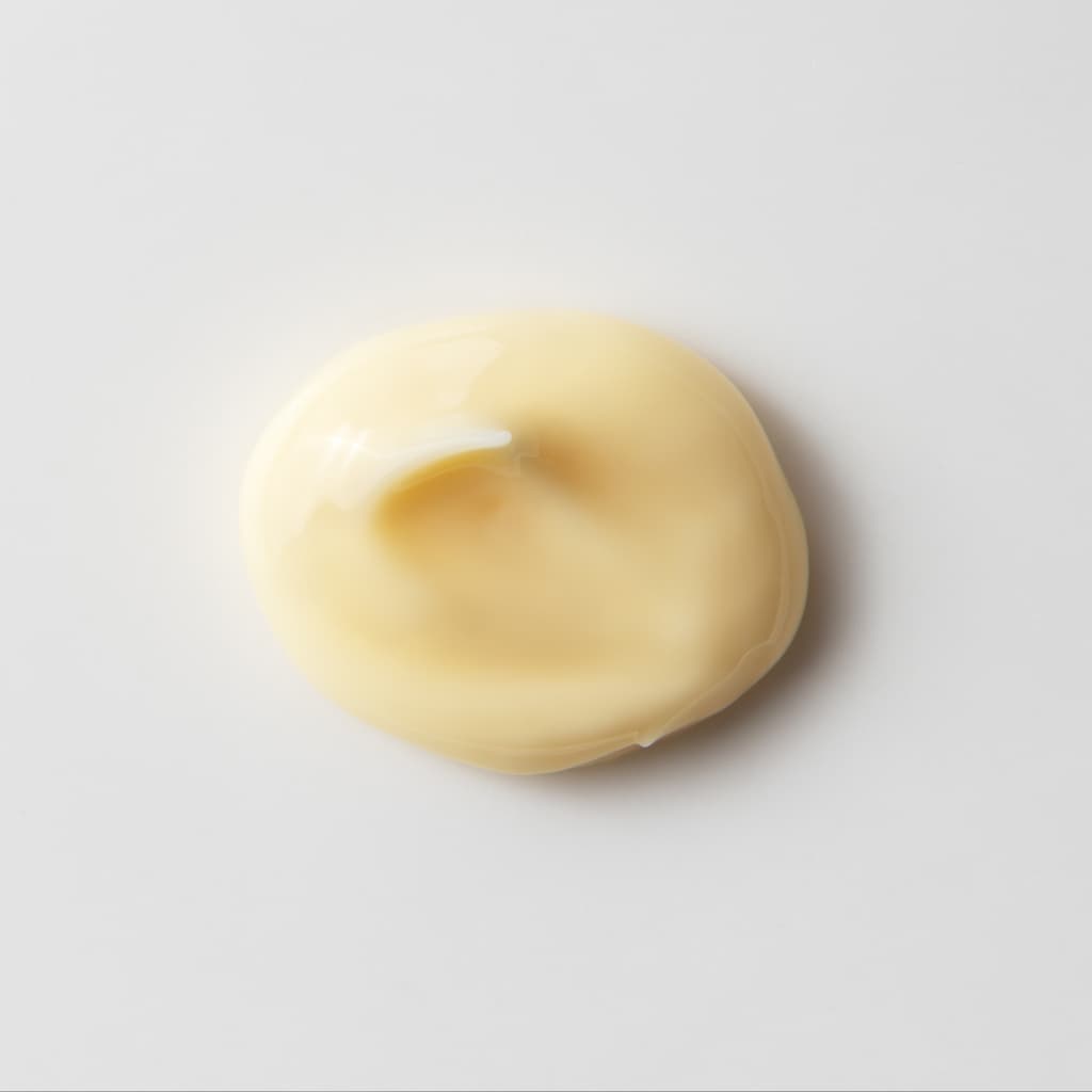 Cream swatch showing the lightweight, breathable texture of Stay Clear Beauty Night Shift Eye &amp; Neck Cream — eye cream and neck cream for fine lines, wrinkles, sagging skin, and dark circles.
