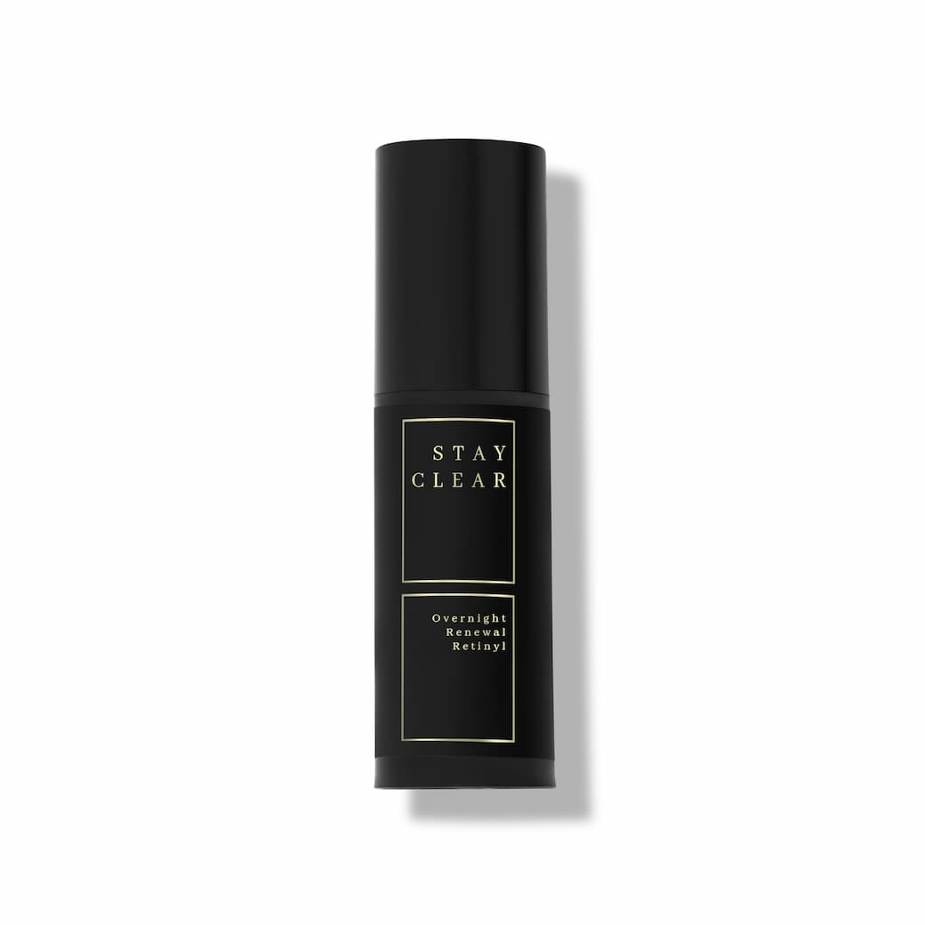 Stay Clear Beauty Overnight Renewal Retinyl bottle on neutral background — retinaldehyde night treatment for skin renewal, fine lines, uneven texture, post-acne marks, and acne-prone skin.
