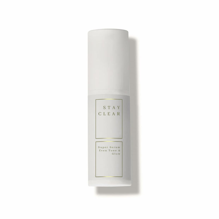Stay Clear Beauty Super Serum Even Tone & Glow airless pump bottle on neutral background — mandelic acid brightening serum for dark spots, post-acne marks, rosacea, uneven skin tone, and sensitive acne-prone skin.
